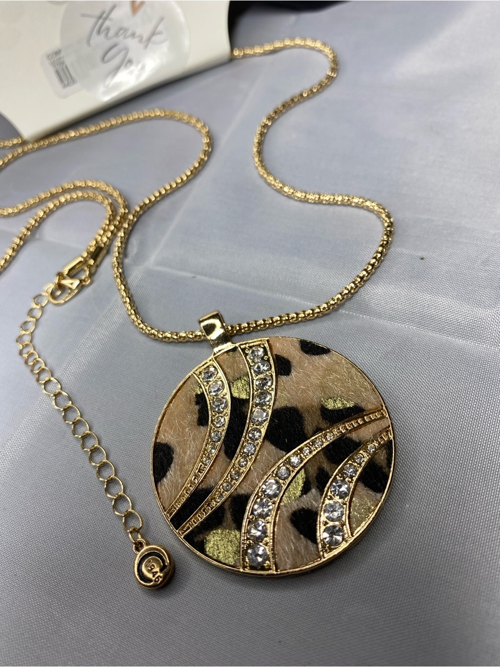Gold-Tone Leopard Print Circle Pendant Necklace with Crystal Accents